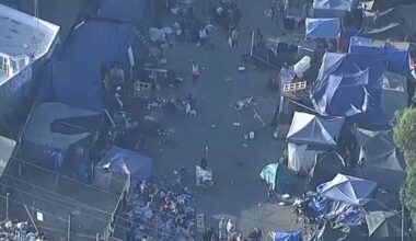 Protesters arrive as 'notorious' homeless encampment in Van Nuys is cleared as part of Los Angeles Inside Safe program