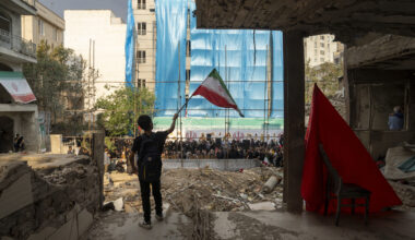Iran flag rubble
