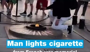 Man lights cigarette from French war memorial • FRANCE 24 English