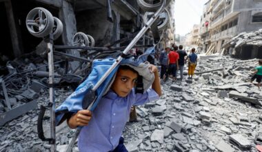 A Palestinian boy after an Israeli strike on a house in Gaza City on Friday. Pic: Reuters