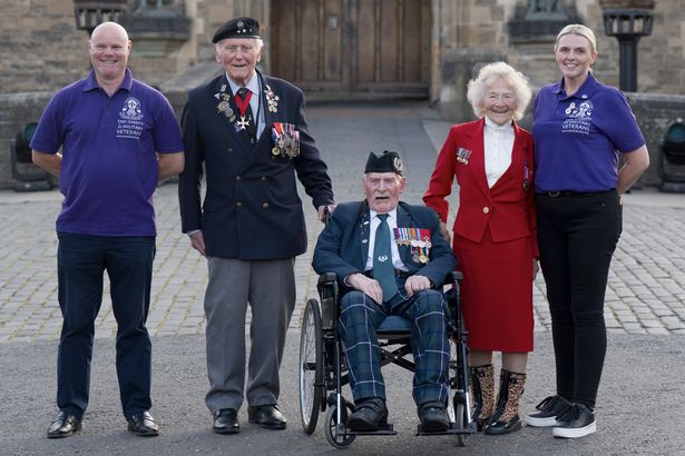 Second World War veterans Eugeniusz Niedzielski, 101, Don Turrell, 100, and Dorothea Barron, 100, with vice chairman Paul Cook (left) and fundraiser and safeguarding officer Keely Allen (right) from the Taxi Charity for Military Veterans, attend the Royal Edinburgh Military Tattoo at Edinburgh Castle during their trip to Scotland organised by the charity