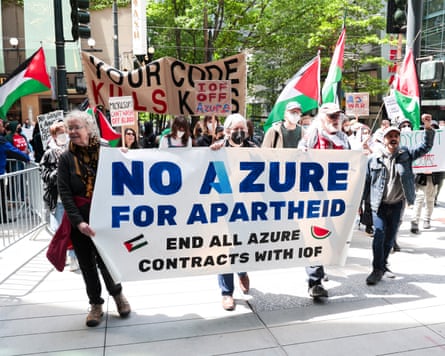 Protesters with a large banner reading in capital letters 'No Azure for apartheid'