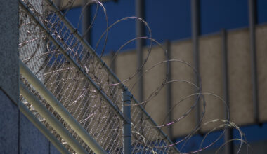 Razor wire is seen on the Metropolitan