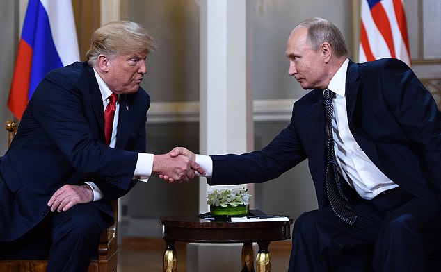 (FILES) Russian President Vladimir Putin (R) and US President Donald Trump shake hands before a meeting in Helsinki on July 16, 2018. US President Donald Trump said on August 8, 2025 he would meet with Russian counterpart Vladimir Putin on August 15 in Alaska, as the Republican billionaire hopes to help mediate an end to the war in Ukraine. (Photo by Brendan Smialowski / AFP) (Photo by BRENDAN SMIALOWSKI/AFP via Getty Images)