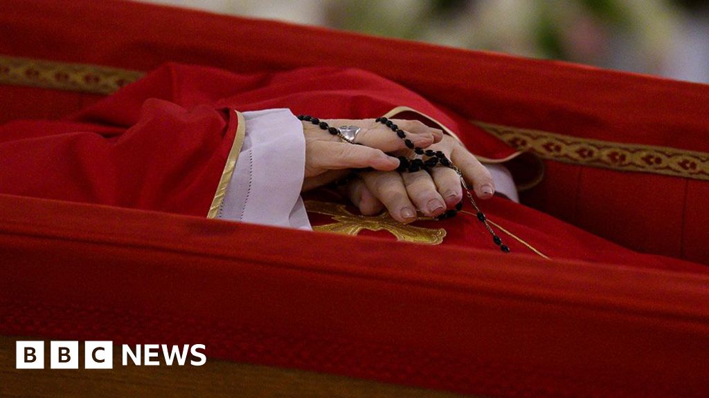 Pope Francis lies in open coffin in Vatican chapel