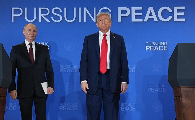 ANCHORAGE, ALASKA - AUGUST 15: U.S. President Donald Trump (R) and Russian President Vladimir Putin leave at the conclusion of a press conference at Joint Base Elmendorf-Richardson on August 15, 2025 in Anchorage, Alaska. The two leaders are meeting for peace talks aimed at ending the war in Ukraine. (Photo by Andrew Harnik/Getty Images)