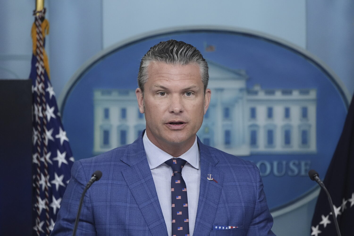 Secretary of Defense Pete Hegseth speaks during a press briefing with President Donald Trump in the...
