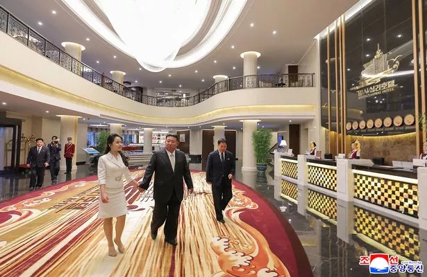  North Korean leader Kim Jong Un (C) and his daughter Kim Ju Ae (L) visiting the resort
