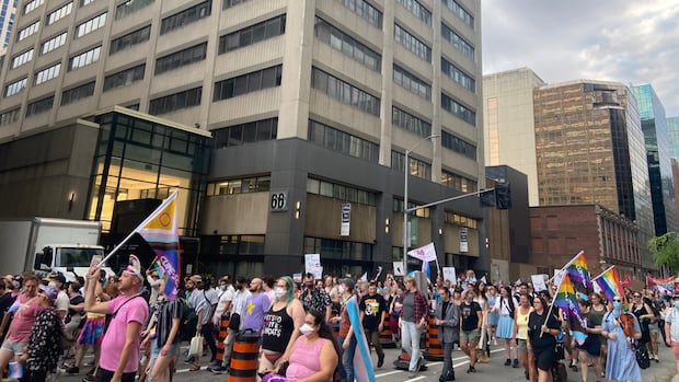 Marchers call on Canada to 'step up' and support trans rights, refugees