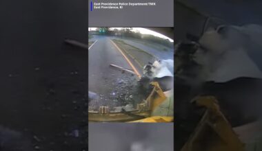 Video shows a car speeding down the road before slamming into the back of a trash truck
