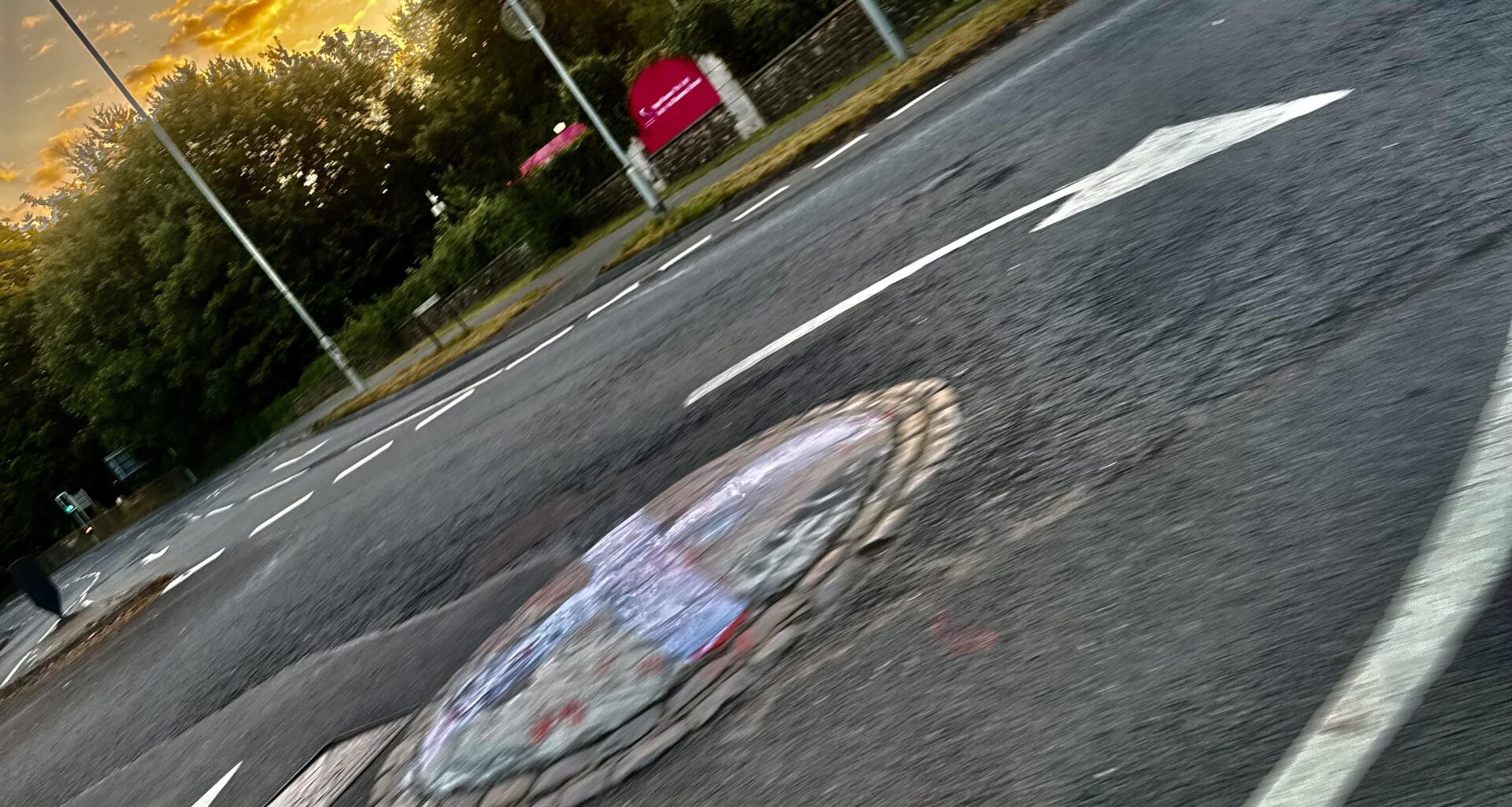 English Flag painted on a Swansea Roundabout😳