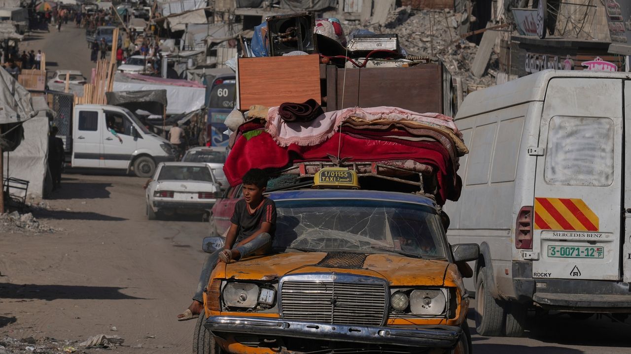 The Latest: Israel says 2 hostages' remains found as Gaza City offensive pushes ahead