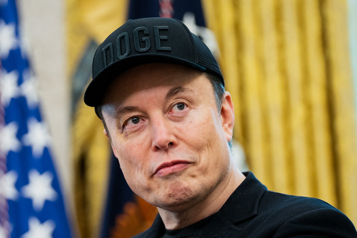 Musk appears to compare UK police to Nazi war criminals after five masked men were arrested trying to get into refugee hotel