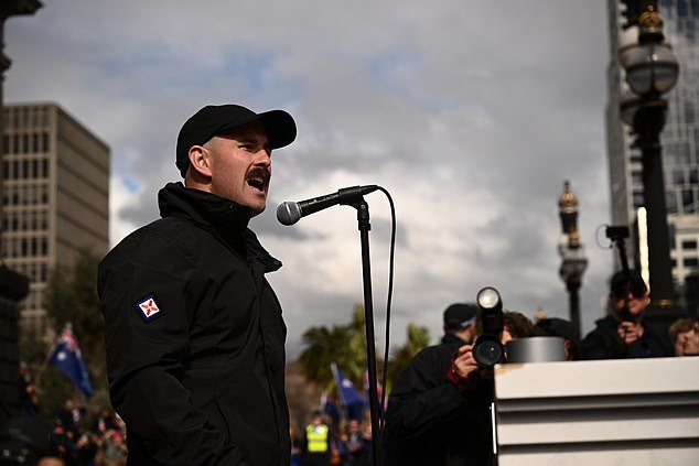 Thomas Sewell speaks to protestors during the March for Australia anti-immigration rally in Melbourne, Sunday, August 31, 2025. (AAP Image/Joel Carrett) NO ARCHIVING