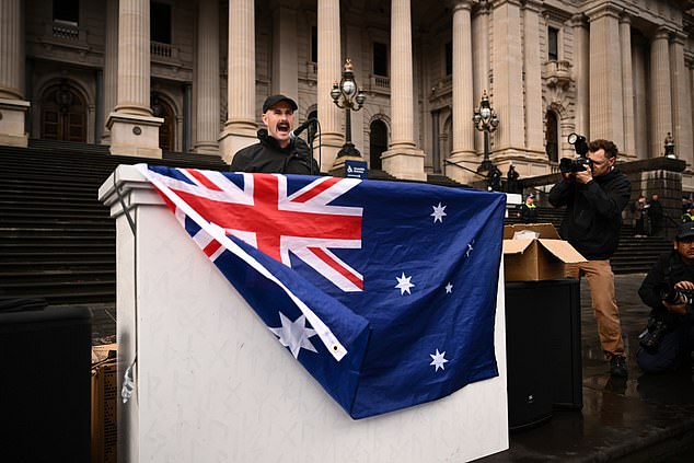 Thomas Sewell speaks to protestors during the March for Australia anti-immigration rally in Melbourne, Sunday, August 31, 2025. (AAP Image/Joel Carrett) NO ARCHIVING