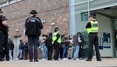 Crowd gathers outside court after city brawl