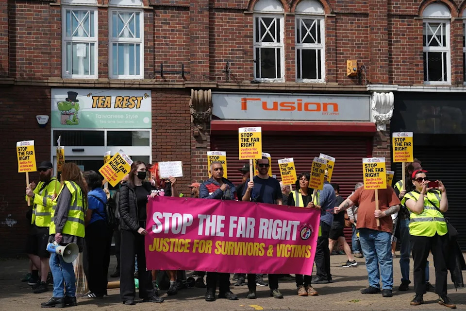 Counter-protesters in Nuneaton on Saturday (Joe Giddens/PA)