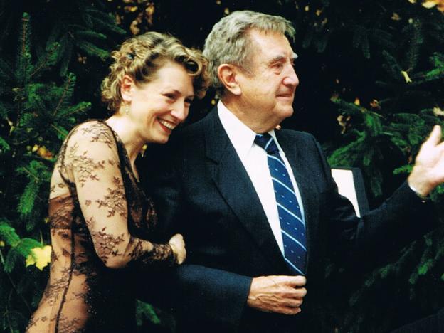 Sara Holmes with her father during her wedding.