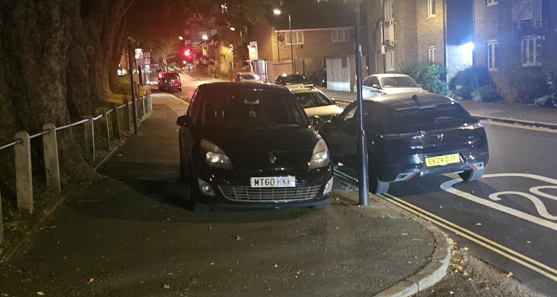 Cars just parked on the pavement