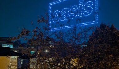 Giant Oasis drone sign