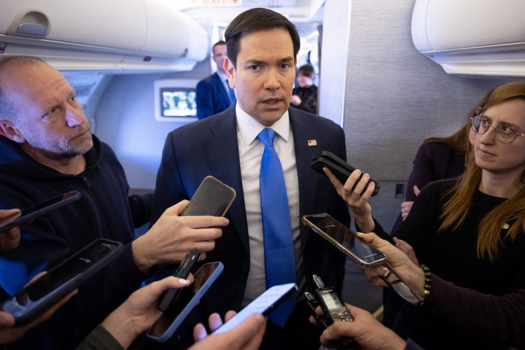 U.S. Secretary of State Marco Rubio speaks with the media on his military airplane as he flies to Jeddah