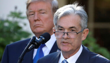 FILE PHOTO: U.S. President Donald Trump looks on as Jerome Powell, his nominee to become chairman of the U.S. Federal Rese...