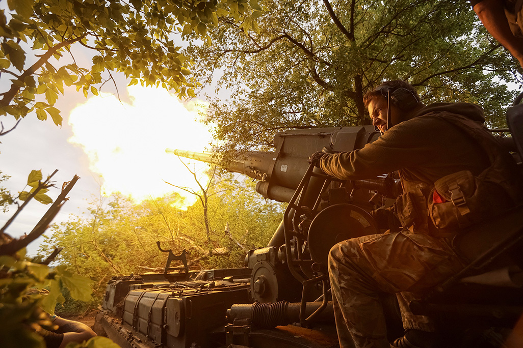 cover Ukraine says it hit Russian oil facilities, military airfield