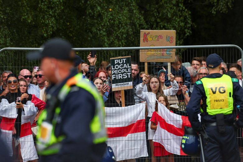 Protesters gathered outside the Bell Hotel in July.