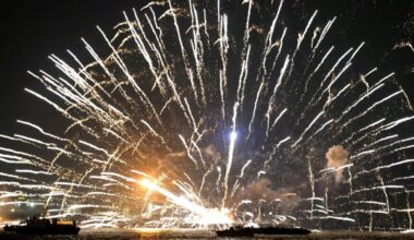 Barges carrying fireworks ablaze in Japan, five flee into sea