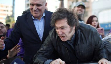 Argentinian President Javier Milei leaves rally after protesters throw rocks | Protests News