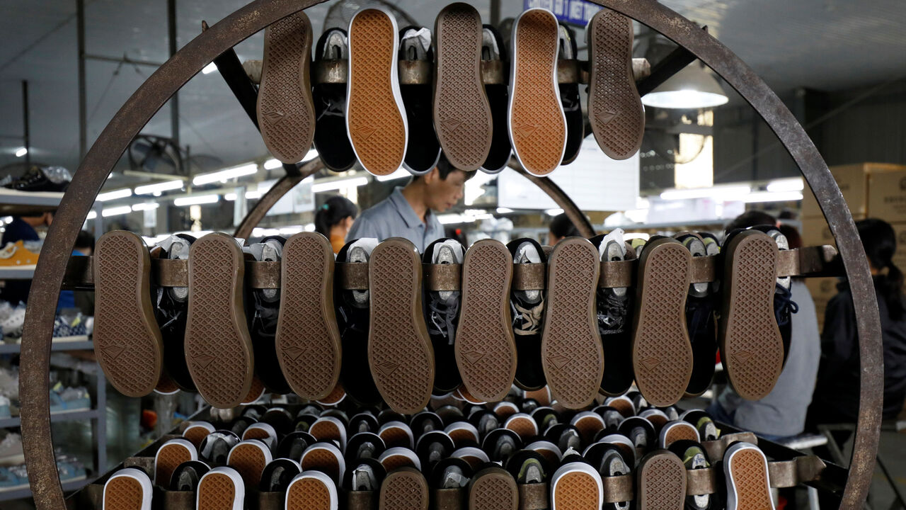 Shoes for export are seen at a shoe factory in Hanoi, Vietnam.