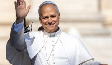Pope Leo XIV waves to the crowds after his Wednesday General Audience on August 6, 2025 from St. Peter's Square inside Vatican City.