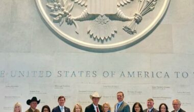 A trade mission led by Gov. Larry Rhoden hopes to expand opportunities for ethanol, beef and other businesses in the United Kingdom and Ireland. The delegation poses for a photo at the U.S. embassy in London.