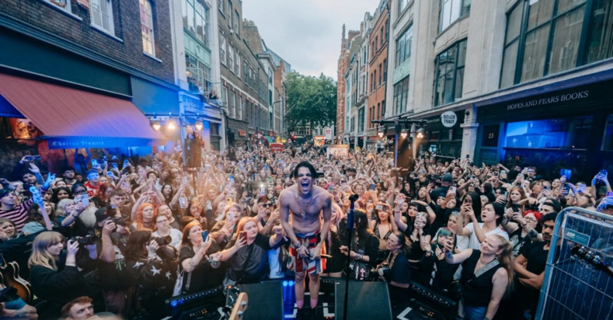 Yungblud plays surprise gig on London's famous Denmark Street as he opens store and fan club