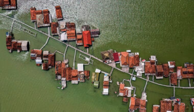 This photo taken on July 30, 2025 shows an aerial view of partially submerged houses due to land loss from climate change at Timbulsloko village in Demak, Central Java.