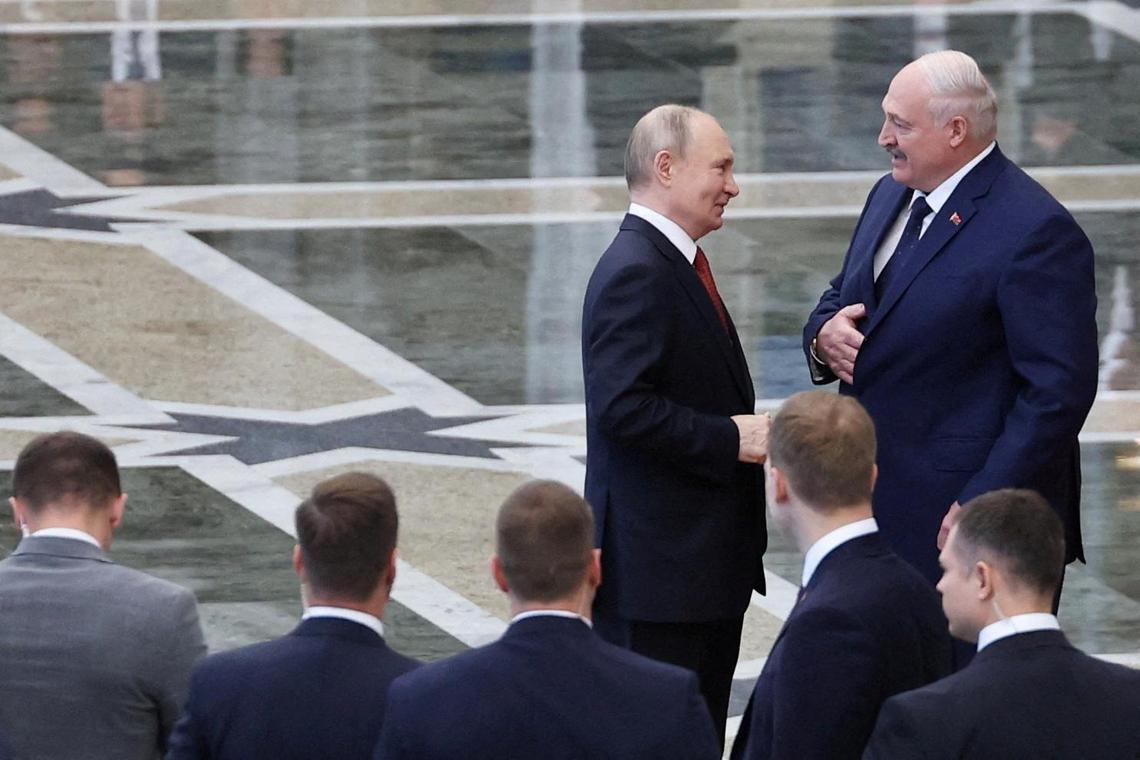 Military drills planned by Russian President Vladimir Putin (left) and Belarusian President Alexander Lukashenko have raised security concerns in neighbouring Poland, Lithuania and Latvia.