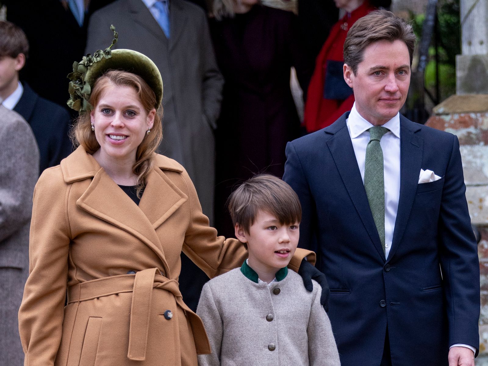 Image may contain Jordan Zimmermann Benjamin Stockham Person Clothing Coat Accessories Formal Wear Tie and Child