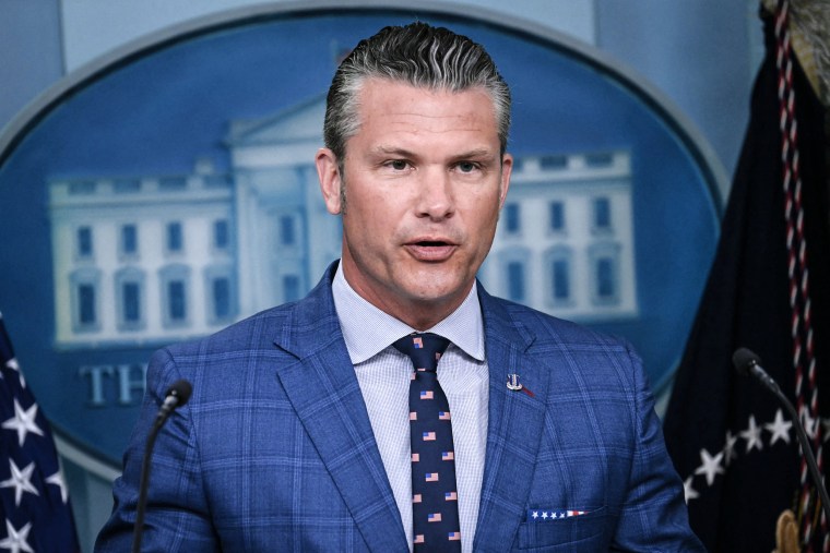 Image: Defense Secretary Pete Hegseth speaks during a news conference 
