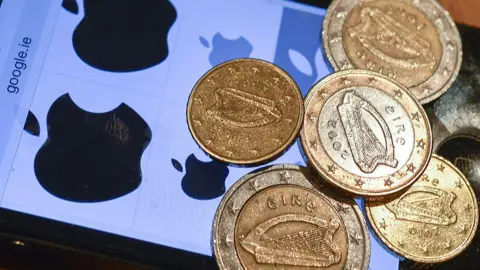 Getty Images Apple logo and euro coins