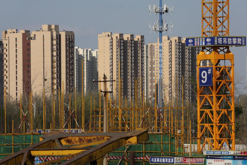 China's new home prices fall again but declines ease in major cities