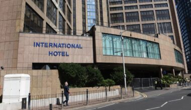 Woman ‘tried to storm migrant hotel with weapon’