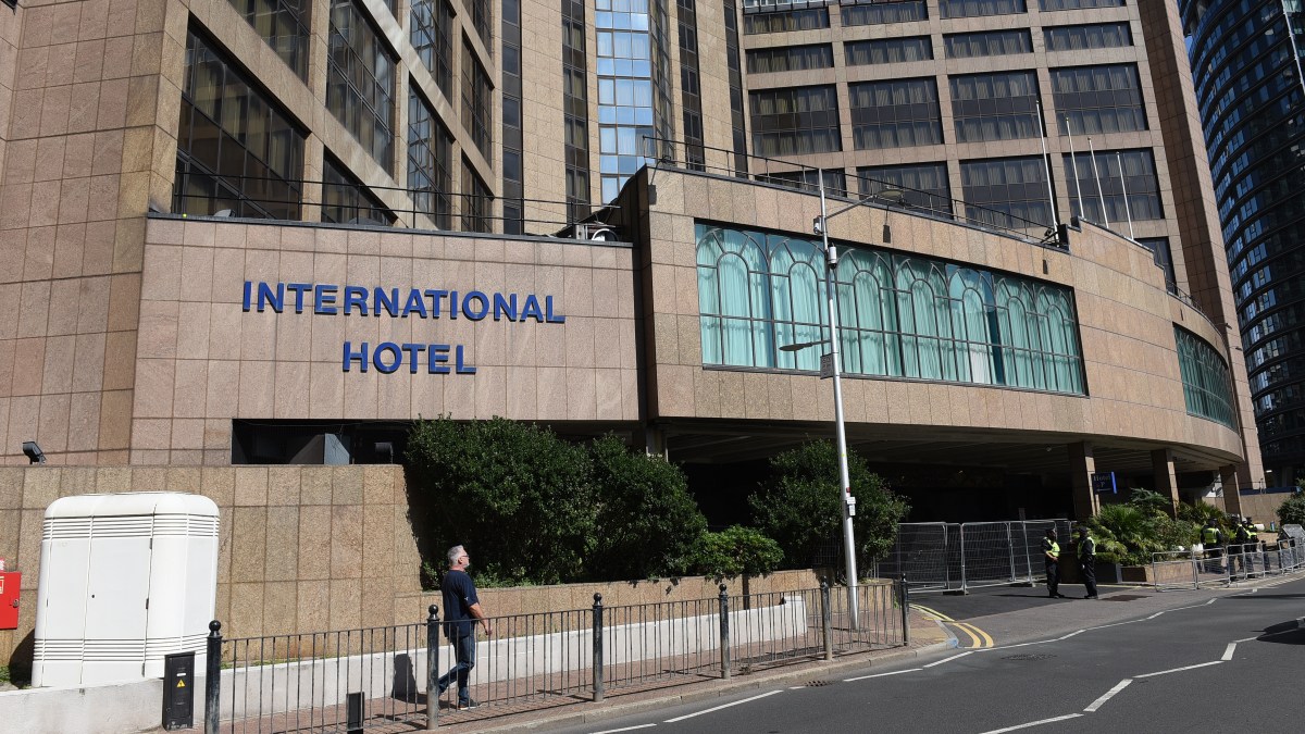 Woman ‘tried to storm migrant hotel with weapon’