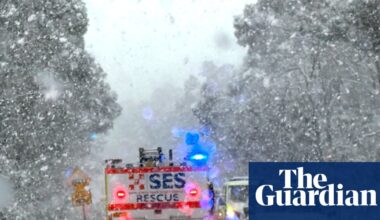 Snow falls in Queensland as NSW SES report 100 vehicles stuck in heavily blanketed northern tablelands | Australia weather