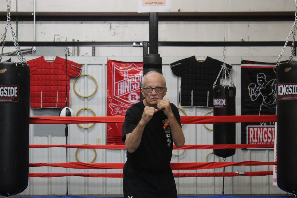 Grand Master Raymond Crow poses at Crow’s Martial Arts Academy, located at 1918 University Business Drive, Ste. 503, in McKinney.