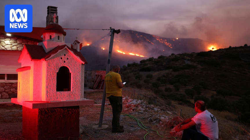 One dead, evacuations underway after wildfires stoked by gale-force winds sweep through Greek towns
