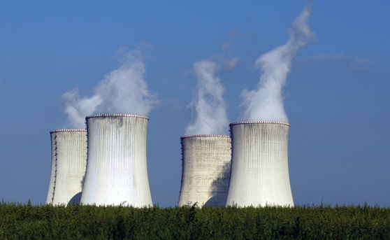 Four of the cooling towers of the Dukovany nuclear power plant rise high above the natural surroundings of Dukovany, Czech Republic, on Sept. 27, 2011. [AP/YONHAP]