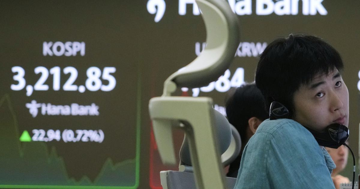 Wall Street edges up to more records following a worldwide rally | Business
