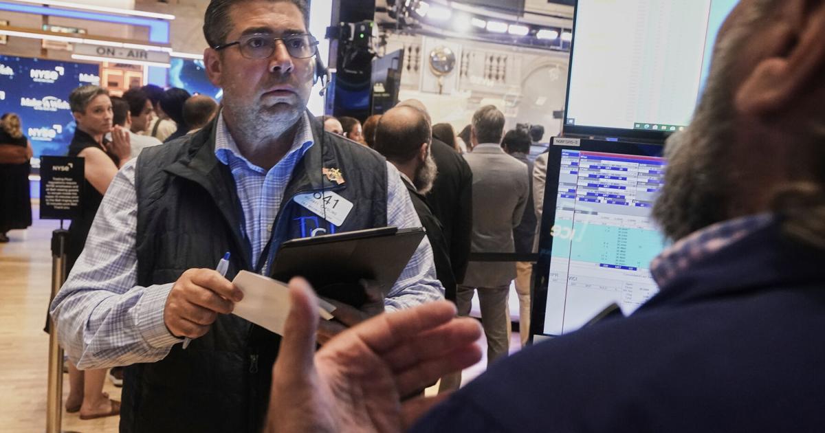 Wall Street hovers near records as markets take in earnings ahead of Powell speech Friday | Business