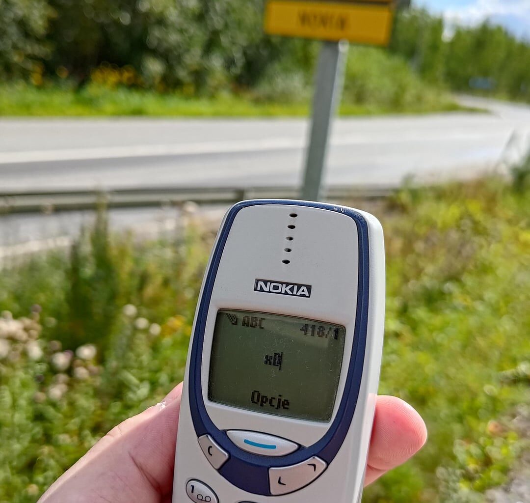 You really think someone would do that? Just charge an old nokia phone battery, fly to Helsinki, take a train to Tampere, then another train to Nokia, walk to the edge of the city, and take a picture of a road sign?