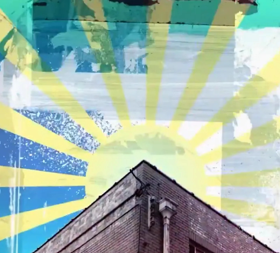 Oasis has received massive backlash online after the band shared a promotional video that prominently features imagery resembling the Rising Sun Flag (Oasis)